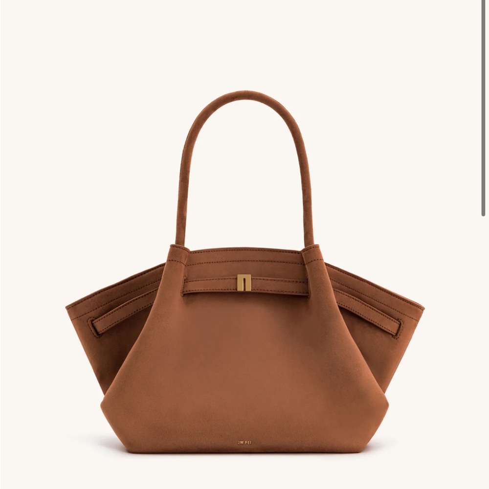 JE PEI BAG BRAND NEW!!! Beautiful light brown color.